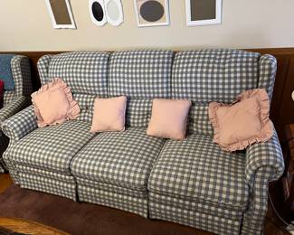 Couch with built-in recliners