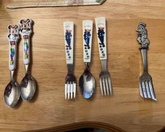 Minnie Mouse, Bozo the Clown, and Donald Duck child's flatware