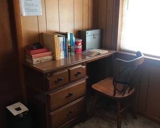 Nice three drawer desk and office chair, vintage and of solid woods.