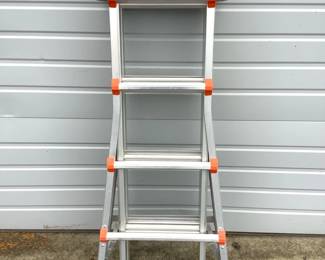 JSHI232 Little Giant Ladder Mega Lite Little Giant ladder system. Duty 300lbs rated. Please look at photos for different size extensions of the ladder. Comes with original manual.