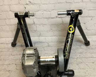 ARKA225 CycleOps Fluid2 Bike Trainer Black indoor bike cycling trainer. Does have resistance that you can use. Does have some wear and scuffs to it but doesn't effect the functioning of this product.