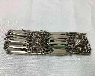 JSHI222 Taxco Mexico Sterling Silver Bracelet Stamped 925 Sterling, believed to be in the 1940's. Mayan Aztec pattern reminiscent of the pyramids on 4 separate panels. Measures approximately L-8in W-1.5.