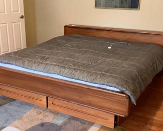 King size bed with storage at headboard and under bed drawers