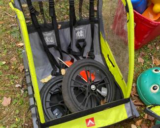 Behind bicycle cart to put kids in