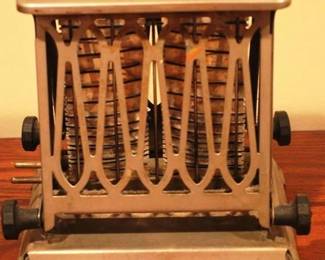 566 - Antique Toaster 6.5 x 11 x 8 Inches
