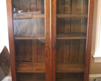 609 - Nicely carved oak 2 door bookcase with gallery
