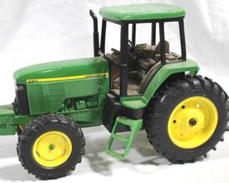 33 - Ertl John Deere 7610 Tractor 11" x 8" x 5.5 Inches
