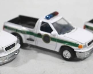 124 - 3 Racing Champions Border Patrol Trucks 5.25 Inch Long
