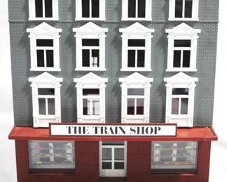 90 - The Train Shop Lighted Building 11 x 10 x 8 Inches

