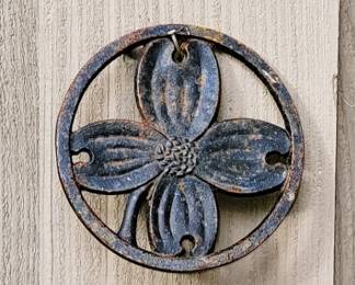 Trivets,  iron owls and flower