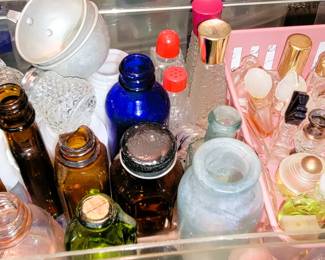 Perfume bottles, amber and blue bottles