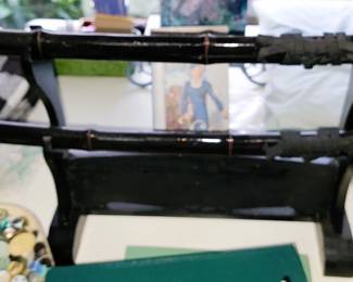 2 Swords on holder. $150 Thursday or $100 Friday