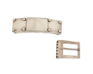 2220
Two Héctor Aguilar Silver Belt Buckles
Héctor Aguilar (1905-1986)
Circa 1940-1945 and 1948-1962; Taxco, Mexico
Each stamped: HA [conjoined]; further variously stamped: 940 / Taxco / Made in Mexico / Sterling
Comprising two sterling silver buckles including a single buckle with incised geometric edge (1.375" H x 1.875" W), and a double-sided buckle with central clasp hook (1.125" H x 4" W), 3 pieces
92.4 grams
Estimate: $200 - $300