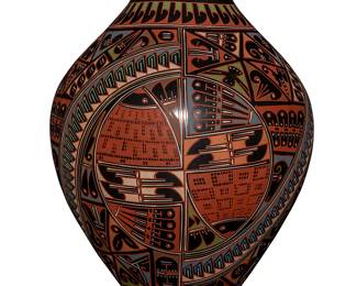 2159
Naty Ortiz And Cesar Nuñez (B. 20th Century; Mata Ortiz, Mexico)
A polychrome pottery jar, early 21st century
Signed to underside: Naty D. Ortiz / Cesar D. Nuñez
The jar with all-over painted geometric motif and banded feather motif rim on black ground
9" H x 6.75" Dia.
Estimate: $200 - $300