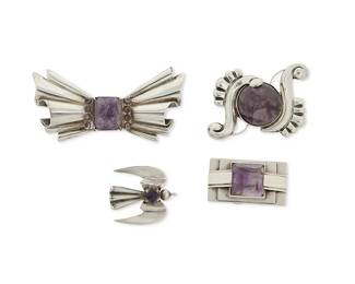 2122
A Group Of Fred Davis Mexican Silver And Amethyst Brooches
Frederick W Davis (1880-1961)
Pre-1948; Mexico City, Mexico
Each stamped: FD; further variously stamped: Silver / Mexico / Made in Mexico / Sterling
Four works comprising stylized silver brooches of various motifs with set amethysts including a rectangular Art Deco-style brooch (0.875" H x 1.5 W), a bow motif brooch (1.5" H x 3.125" W), a silver swirl brooch with large amethyst cabochon (1.5" H x 2.125" W), and a small angel pin (1.375" H x 1.125" W), 4 pieces
69.8 grams gross
Estimate: $800 - $1,200