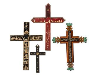 2069
A Group Of Straw Appliqué Devotional Crosses
Four works:

A Paula Rodriguez straw applique cross, circa 1999
Signed and dated in pencil verso; further marked: Santa Fe, New Mexico
In black painted wood with straw images of various saints
18" H x 12" W x 0.5" D

A Mel Rivera straw applique cross, circa 1995
Signed and dated in pencil verso; further marked: Santa Fe, New Mexico
In red painted wood with straw images of the Nativity, as well as of hummingbirds and flowers
18" H x 13" W x 0.75" D

A Charlie Sanchez Jr. straw applique "Tree of Life" cross, circa 1997
Signed, titled, and dated in ink verso; further marked: Tomé, New Mexico
In polychrome carved and painted wood with straw applique floral motifs
18.125" H x 13.25" W

A Miranda Lopez straw applique cross, late 20th century
Signed in ink verso
In painted black wood with straw applique star motifs
10" H x 5.5" W x 0.75" D

4 pieces
Estimate: $800 - $1,200