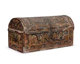 2053
Late 18th/early 19th century
A Spanish Colonial Tooled Leather Trunk
Appears unmarked
The wood trunk with hinged barrel lid and three sides wrapped in polychromed tooled leather and the back of carved and polychromed wood, with iron hardware, lock latch, and opposed handles
16.5" H x 33" W x 16.5" D
Estimate: $3,000 - $5,000