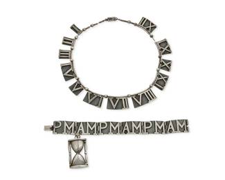 2190
A Set Of Margot De Taxco AM/PM Jewelry
Margot Van Voorhies (1896-1985)
Circa 1948-1978; Taxco, Mexico
Each stamped: Margot de Taxco / Sterling / Made in Mexico / Eagle 16 / [Design number]
Comprising a sterling silver Roman numeral link necklace (15.5" L x 0.75" H) and a sterling silver AM/PM link bracelet with hourglass charm (7.25" L x 2.25" H), 2 pieces
127.2 grams
Estimate: $800 - $1,200