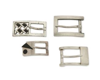 2221
A Group Of Antonio Pineda Silver And Onyx Belt Buckles
Antonio Pineda (1919-2009)
Circa 1953-1979; 1962-1963; Taxco, Mexico
Each marked with crown for Antonio Pineda, and for Mexico; further variously marked: Sterling / 925 / 970 / [Eagle 58] / [Eagle 17] / Los Castillo / Soc / Coop / SCL / Sec2 / [Design number]
Four works:
A group of four sterling silver buckles including with one with inlaid black abstract design (1" H x 2" W), a buckle with lattice work design and onyx stones (No. PZ195; 1.125" H x 2.5" W), a heavy silver buckle (No. PZ127; 1.625" H x 2.25" W), a smaller heavy silver buckle with wave design ends (No. PZ121; 1.25" H x 2" W), 4 pieces
194.1 grams gross
Estimate: $400 - $600