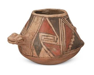 2160
Late 19th century
A Casa Grande Turtle Jar
Appears unmarked
The pot with high relief turtle head and opposed tail with four protrusions for legs, decorated in three-color kiva step and geometric motifs
5.5" H x 9" W x 6.5" D
Estimate: $200 - $400