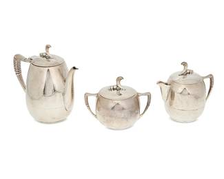 2214
A Juventino Lopez Reyes Sterling Silver Coffee Service
Juventino Lopez Reyes (b. 1915)
Mid-20th century; Mexico
Two stamped for Juventino Lopez Reyes and: Made in Mexico / [Eagle 9] / 13
Comprising a coffee pot (6.625" H x 7" W x 3.5" Dia.), a lidded creamer (5.125" H x 5.25" W x 3.325" Dia.), and a lidded sugar bowl (4.25" H x 5.5" W x 3.75" Dia., 3 pieces
41.8 oz. troy approximately
Estimate: $700 - $900