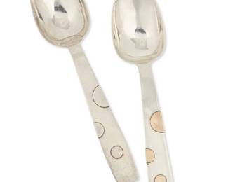 2107
Two William Spratling "Disco" Sterling Silver Spoons
William Spratling (1900-1967)
Circa 1962-1965, Third Design Period; Taxco, Mexico
Each stamped for William Spratling and sterling; further stamped: [Eagle 30]
One spoon with silver applied discs, one with gold applied discs, 2 pieces
Each: 7.325" L
4.7 oz. troy approximately
Estimate: $300 - $500