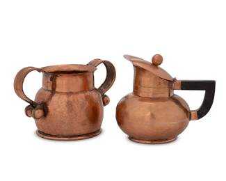 2210
A Héctor Aguilar Copper Cream And Sugar Set
Héctor Aguilar (1905-1986)
Circa 1948-1962; Taxco, Mexico
Each marked for Héctor Aguilar and Taxco, Mexico
Comprising one creamer with ebonized wood handle and a sugar with opposed lug handles, 2 pieces
Creamer: 4.125" H x 4.875" W x 3.75" D; sugar: 3.625" H x 5.875" W x 3.5" D
Estimate: $200 - $300