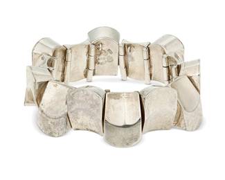 2152
An Antonio Pineda Mexican Silver Bracelet
Antonio Pineda (1919-2009)
Circa 1953-1979; Taxco, Mexico
Crown mark for Antonio Pineda; further stamped: JVL Taxco / 970 / [Eagle 208]
Comprising a chunky sterling silver hinged link bracelet with alternating thumbnail motif links
7" L x 0.975" H
126.9 grams
Estimate: $500 - $700