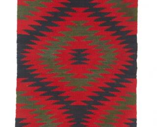 2228
A South American Woven Wool Panel
Mid/late 20th century
Woven in red, green, and dark blue wool in an all-over pattern of serrated diamonds in a tapestry-style weave
89" H x 21.5" W
Estimate: $200 - $300
