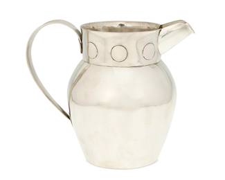 2100
A William Spratling "Disco" Sterling Silver Water Pitcher
William Spratling (1900-1967)
Circa 1962-1964, Third Design Period; Taxco, Mexico
Stamped for William Spratling and sterling; Further stamped: [Eagle 30]
The water pitcher with circle dots motif to rim
7.5" H x 9" W x 5.5" D
25.4 oz. troy approximately
Estimate: $1,000 - $1,500