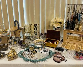 The jewelry boxes and red coral necklace are sold.