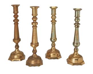 1055
Early 20th century
Four Brass Candlesticks
Each unmarked
Two pairs of candlesticks similarly designed
Larger pair: 19.5" H x 5.5" Dia.; smaller pair: 18.5" H x 5.75" Dia.
Estimate: $700 - $900