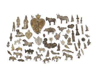 1114
A Large Group Of Mixed Metal Mexican Milagro Charms
Early/mid-20th century and earlier
Comprising a large group of milagro votive charms in various shapes, sizes, and metals, including multiple figures, horses, donkeys, bulls, pigs, dogs, birds, and hearts, 57 pieces approximately
Largest: 3.75" H x 2.625" W; Smallest: 0.5" H x 0.875" W
Estimate: $500 - $700