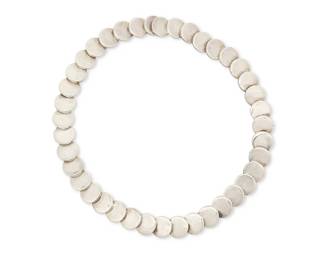 1227
A Fred Davis Silver Link Necklace
Frederick W Davis (1880-1961)
Pre-1948; Mexico City, Mexico
Stamped: FD / Silver / Mexico
A narrow necklace with small silver disc links
16" L x 0.5" Dia.
56.9 grams
Estimate: $600 - $800