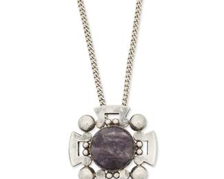 1175
A Fred Davis Mexican Sterling Silver Pendant/Brooch
Frederick W Davis (1880-1961)
Pre-1948; Mexico City, Mexico
Pendant stamped: Silver / Made in Mexico; chain stamped: Sterling
Comprising a silver quatrefoil pendant/brooch with silver ball accents and a large central set cabochon amethyst, on an associated sterling silver chain, 2 pieces
20.25" L x 2.125" H 2" W
55.7 grams gross
Estimate: $600 - $800