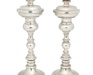 1049
Mid-20th century; Mexico City, Mexico
A Pair Of Sanborns Sterling Silver Candlesticks
Each marked to underside: [Three owls] / Sanborns Mexico / Sterling
The Spanish Colonial-style candlesticks with multiple lobed waists, 2 pieces
Each: 13.75" H x 5" Dia.
56.9 oz. troy approximately
Estimate: $800 - $1,200