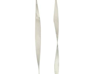 1314
Elijah David Herschler
b. 1940
Free-Standing Ribbon Sculptures
Chromed metal
Each signed and dated illegibly to base
2 pieces
Larger: 37" H x 4" Dia.; smaller: 33.325" H x 4" Dia.
Estimate: $400 - $600