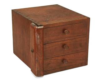 1180
20th century
Fred Davis's Wood Jewelry Box
Appears unmarked
The three-drawer casket with dovetail joints and side locking mechanism on brass hinges
10.25" H x 12" W x 13.5" D
Estimate: $200 - $300