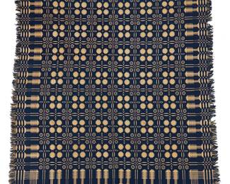 1179
19th century
An American Blue And White Woven Coverlet
A two-piece blue and white double cloth coverlet with fringed edges, woven in likely wool and cotton in an all-over geometric pattern in a simple combination of blocks, and with a central vertical seam and a rolled hem to top edge
85" H x 80" W approximately; fringe: 2.5" L
Estimate: $200 - $300