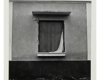 1029
Mariana Yampolsky
1925-2002
Window
Gelatin silver print on paper mounted to a board mount
Signed in pencil on the mount, lower right: M. Yampolsky; inscribed in pencil, verso: With love for Amy / Mariana
Image/Sheet: 6.25" H x 6.25" W; Mount: 14" H x 11" W
Estimate: $600 - $800