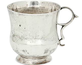 1128
19th century or later
A Spanish Colonial Silver Mug
Appears unmarked
The mug with scrolled handle
4.25" H x 5.5" W x 4.25" D
11.3 oz. troy approximately
Estimate: $200 - $400
