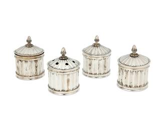 1324
Early/mid-20th century
Four Silver Desk Set Items
Each appears unmarked
Comprising two ink wells with lead inserts, one nib container with pierced top lid, and one sander with inner cove finely pierced in a star motif, 4 pieces
Each: 4.125" H x 3" Dia.
34.5 gross oz. troy
Estimate: $200 - $400