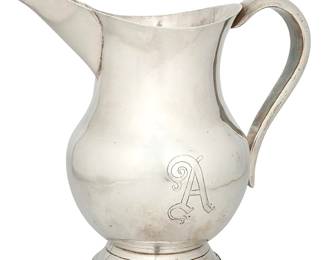 1092
19th century or later
A Spanish Colonial Silver Ewer
The water pitcher with curved handle and folded pour spout, personalized
8.75" H x 9.5" W x 5.875" D
41.4 oz. troy approximately
Estimate: $300 - $500