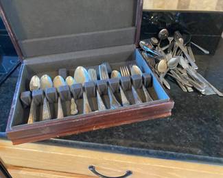 Assorted silverware some silver plated in antitarnish box