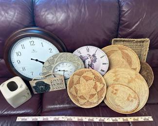 Collection Of Wall Clocks Decor Baskets And Other Decor