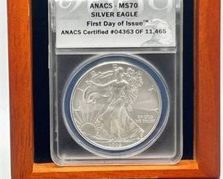 Lot 155   8 Bid(s)
2009 Silver American Eagle ANACS MS70 First Day of Issue w/COA