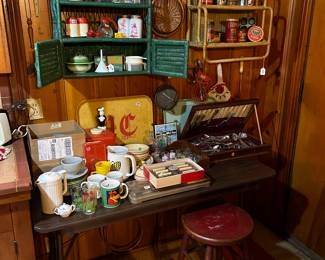 Silverware in case, red wood stool