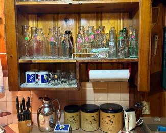 Collection of Milk Bottles, refrigerator water jugs, metal Canister Set, Morton Salt coffee cups & coasters, 