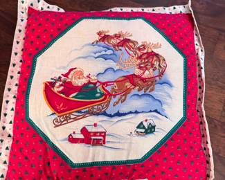 Throw pillow of Santa on his sleigh 14"