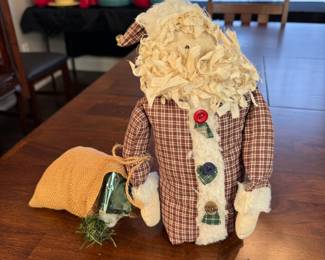 Cloth santa decoration (gift needs glued back into sack) 10"H